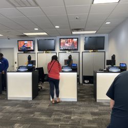 Spectrum - Open lanes but employees are all in the back not helping customers