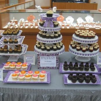 Oh Sue Sweet - a display of cupcakes and pastries - Desserts Near Me Oh Sue Sweet - a display of cupcakes and pastries - Desserts Near Me