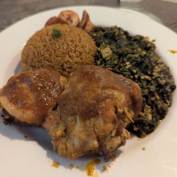 West Hut - I love Spinach: Cut spinach In a rich and flavorful seasoned stew with mushrooms and egusi seeds with Chicken with Jollof Rice - African Near Me - Phoenix, Arizona