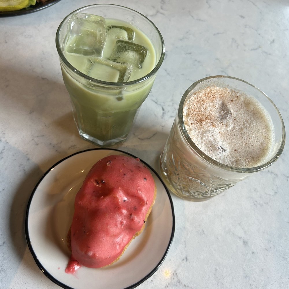 Hexe Coffee - Drinks - Iced Matcha oat milk latte and Chai White Russian Pastry - Blackberry lime skull cake (gluten free) - Coffee & Tea Near Me - Chicago, Illinois