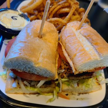 Fat Katz - The mahi mahi sandhwich came on a roll but packed a great fish to veg ratio! Loved the onion straws, lightly battered and not too heavy. - New American Near Me - Fort Myers, Florida