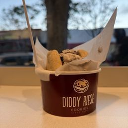 2 white chocolate chip cookies w/ cookies and cream ice cream