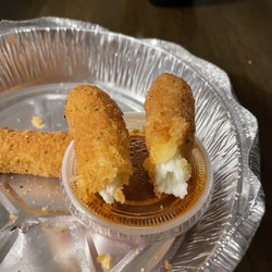 Mozzarella sticks with roughly the same texture as a stick of cheese wrapped in plastic. Freezing cold and grainy.