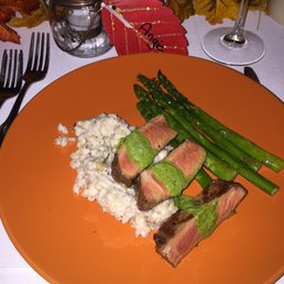 Grilled NY strip loin, chimichurri, farro, roasted asparagus and manchego Grilled NY strip loin, chimichurri, farro, roasted asparagus and manchego