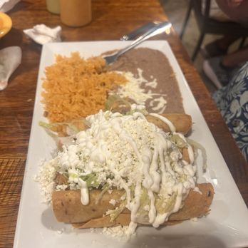 Taqueria El San Luis - Flautas with Mexican rice and refried beans which - Mexican Near Me - Savannah, Georgia Taqueria El San Luis - Flautas with Mexican rice and refried beans which - Mexican Near Me - Savannah, Georgia