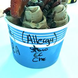 Curly Cream Rolled Ice Cream - Chocolate Rolled Ice cream from Curly Cream. Banana, strawberries, chocolate chips and chocolate sauce!