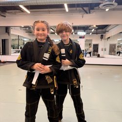 Odin's Halls Brazilian Jiu Jitsu And Fitness - Carson and Noalani leveling up. Hardest workers in the room.