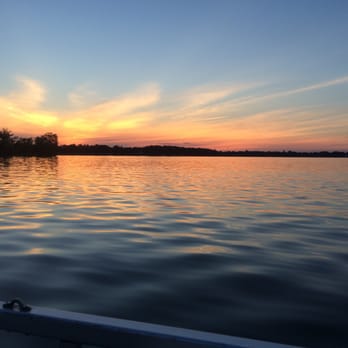 Palmer Lake Lodges - Sunset view from a pontoon boat near the dock at Palmer Lake Lodges. So beautiful! - Hotels Near Me - Colon, Michigan Palmer Lake Lodges - Sunset view from a pontoon boat near the dock at Palmer Lake Lodges. So beautiful! - Hotels Near Me - Colon, Michigan