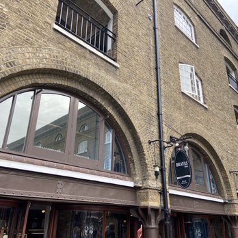 Bravas Tapas - The outside of the restaurant with the sign - Spanish Near Me - London, XGL Bravas Tapas - The outside of the restaurant with the sign - Spanish Near Me - London, XGL