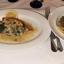 Positano Ristorante & Bar - Wild Salmon stuffed with crab and spinach. Side of penne bolognese.