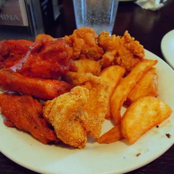 Uno 1 China Super Buffet - On this plate: 2 kinds of Chicken Wings (fried or in Buffalo sauce), Chicken Nuggets, Catfish, and Potato Wedges. - Buffets Near Me - Irving, Texas Uno 1 China Super Buffet - On this plate: 2 kinds of Chicken Wings (fried or in Buffalo sauce), Chicken Nuggets, Catfish, and Potato Wedges. - Buffets Near Me - Irving, Texas