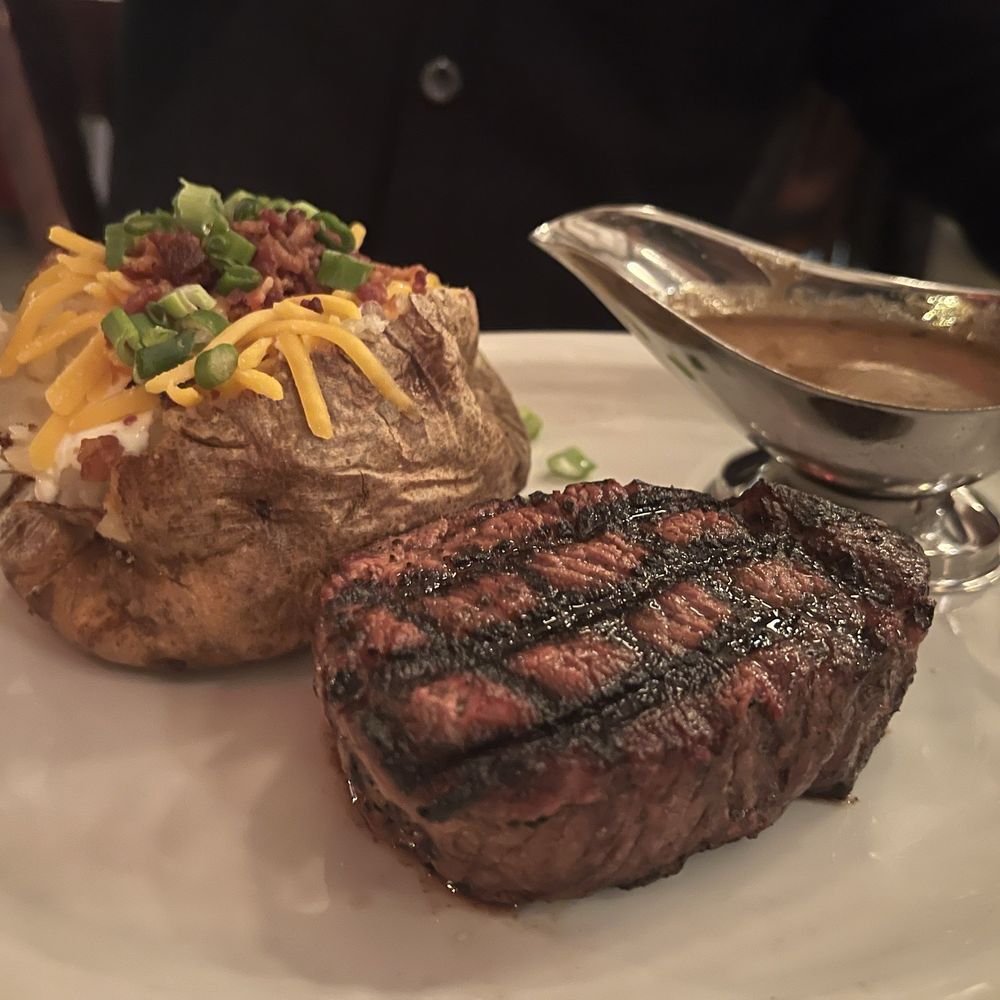Cowfish - NY strip with loaded potato - New American Near Me - Hampton Bays, New York Cowfish - NY strip with loaded potato - New American Near Me - Hampton Bays, New York
