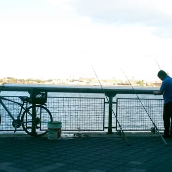 NYC Greenway Path - Fisherman on the Greenway, around 14th street. - Parks Near Me