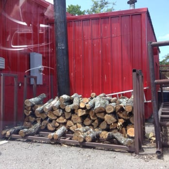 Bodacious Bar-B-Q - Real oak for smoker - Barbeque Near Me - Sulphur Springs, Texas