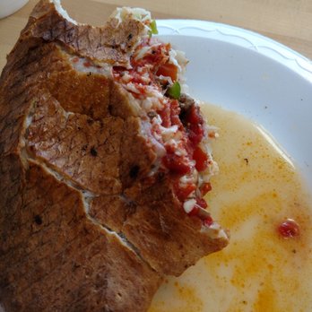 Lomatos Pizza - Sooper Calzone with Tomatoes and Sauerkraut - Pizza Near Me - Hays, Kansas Lomatos Pizza - Sooper Calzone with Tomatoes and Sauerkraut - Pizza Near Me - Hays, Kansas