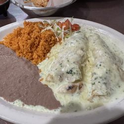 Brisa's Tex Mex Restaurant - Poblano chicken enchiladas, rice, refried beans.