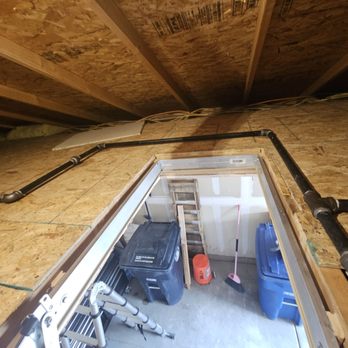 Extra Mile Builders - Added larger attic entrance, moved gas line, installed ladder and decking to attic floor - General Contractors Near Me