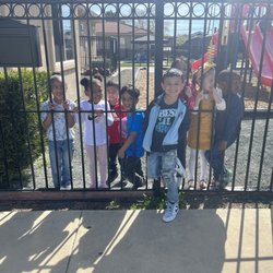 This pic was on my son's 5th b day,he got there late&the kids were outside! When he walked up, they all ran to the gate to say hi to him!