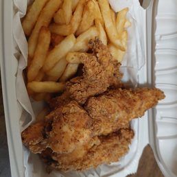 The chicken tenders and fries The chicken tenders and fries