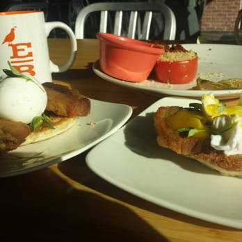 Early Bird - Perfect golfball poached egg to the left and cracked poached egg to the right. (Pork belly eggs benedict) - New American Near Me - Fullerton, California Early Bird - Perfect golfball poached egg to the left and cracked poached egg to the right. (Pork belly eggs benedict) - New American Near Me - Fullerton, California