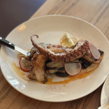 Radici - Polpo - grilled octopus with hummus and grilled vegetables - Italian Near Me - Forest Hills, New York Radici - Polpo - grilled octopus with hummus and grilled vegetables - Italian Near Me - Forest Hills, New York