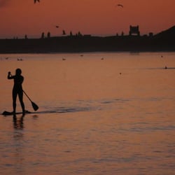 Mavericks PaddleSports - Sunset paddles will never let you down.