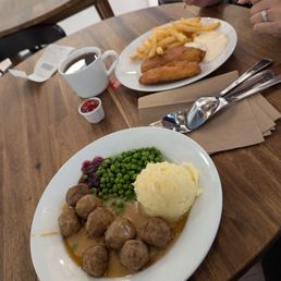 Swedish meatballs with gravy, mashed potatoes and lingonberry sauce, and fish and chips with tartar sauce