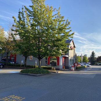 McDonald's - a parking lot with cars parked in front of it - Fast Food Near Me - New Westminster, British Columbia