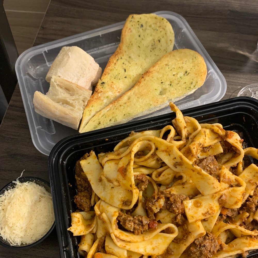 Pappardelle with Meat Sauce Bolognese and garlic bread Pappardelle with Meat Sauce Bolognese and garlic bread