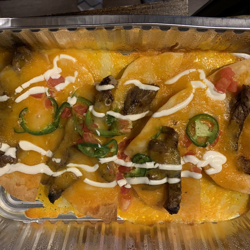 Local Lime | Rogers - Ribeye Nachos. Normally comes with beans but we had those taken off. - Mexican Near Me - Rogers, Arkansas Local Lime | Rogers - Ribeye Nachos. Normally comes with beans but we had those taken off. - Mexican Near Me - Rogers, Arkansas