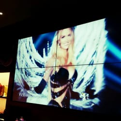 Victoria's Secret - Victoria's Secret show playing on a big screen in the shop ;)