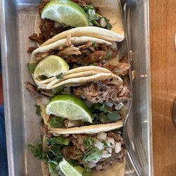 Tacos 4 Life - Street tacos.  Two carnitas, a chicken, and ground beef.  Was hoping it would be carne asada but no.  Still good.