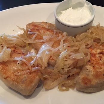 Maple Leaf Diner - Perogies - they were awesome (and huge!) Normally they come with peppers and onions but I ordered with no peppers. - American Near Me - Dallas, Texas