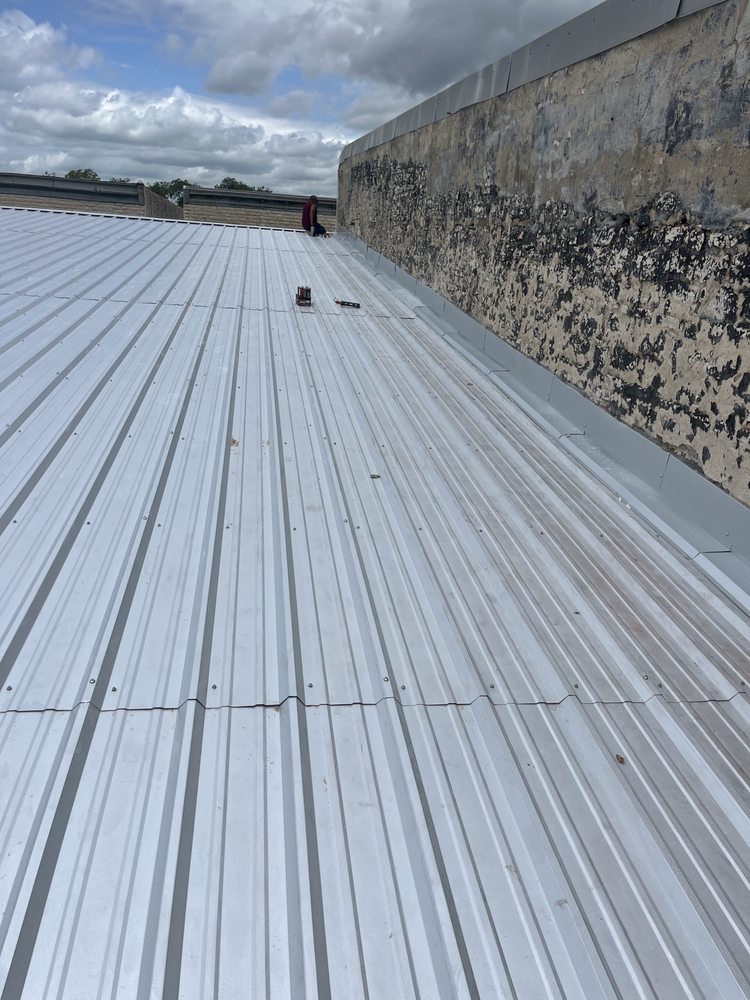 Slide of Andis Roofing & Remodeling