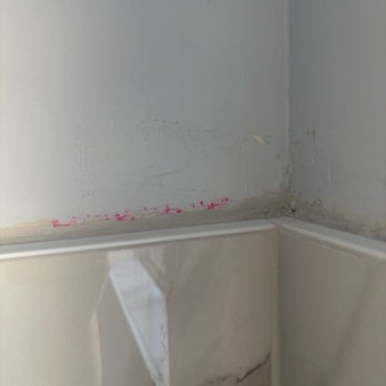 Prime Tile and Stone Construction - Grout used instead of caulking above tiles between drywall. Also red guard smears - General Contractors Near Me Prime Tile and Stone Construction - Grout used instead of caulking above tiles between drywall. Also red guard smears - General Contractors Near Me