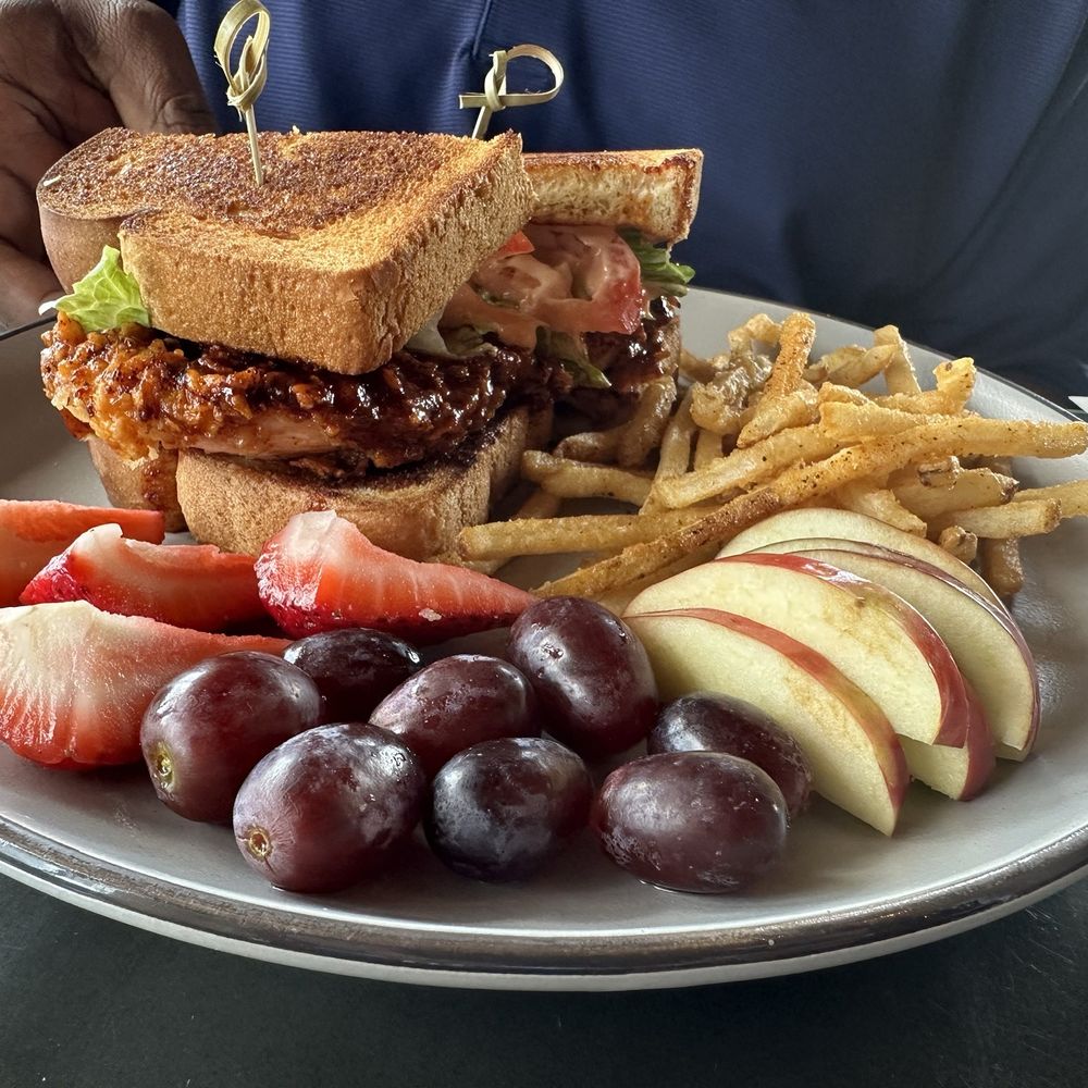 The District - Nashville Hot Sandwich (He added lettuce & tomato) - New American Near Me - Ponchatoula, Louisiana The District - Nashville Hot Sandwich (He added lettuce & tomato) - New American Near Me - Ponchatoula, Louisiana