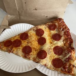 Single slice pepperoni pizza, it is massive, and a steal at only $6!
