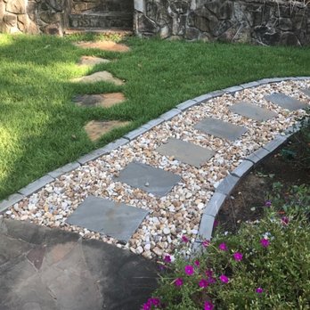 TruGreen Lawn Care - a stone path in a garden - Lawn Services Near Me - Norcross, Georgia TruGreen Lawn Care - a stone path in a garden - Lawn Services Near Me - Norcross, Georgia