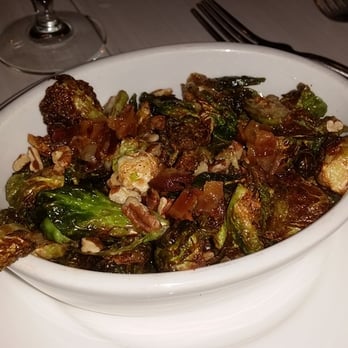 Table 28 - Fried brussels sprouts with bacon and pecans - New American Near Me - Little Rock, Arkansas Table 28 - Fried brussels sprouts with bacon and pecans - New American Near Me - Little Rock, Arkansas