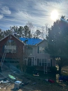 Slide of The Paris Roofing Company Too