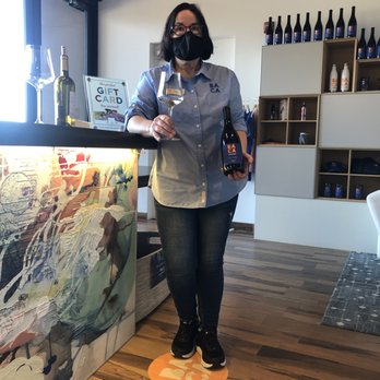BACA Wines - Our knowledgable wine educator next to the "art-bar." - Wine Tasting Room Near Me - Healdsburg, California BACA Wines - Our knowledgable wine educator next to the "art-bar." - Wine Tasting Room Near Me - Healdsburg, California