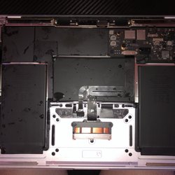 Elite IT Tech - Macbook opened for cleaning from water damage
