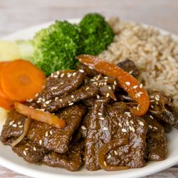 Loving Hut - Soy protein slices, onion, broccoli and bell peppers stir-fried with Mongolian sauce; served with rice