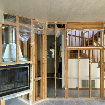 CJ & J Construction - Wall & Fireplace Opened-Up - General Contractors Near Me