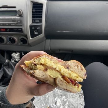 Round Bagels and Donuts - Egg and bacon sandwich on a blueberry bagel - Donuts Near Me - Wilmington, North Carolina Round Bagels and Donuts - Egg and bacon sandwich on a blueberry bagel - Donuts Near Me - Wilmington, North Carolina