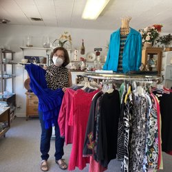 Collectors Corner Resale & Consignments Shop - You'll find Designer Clothing up front.