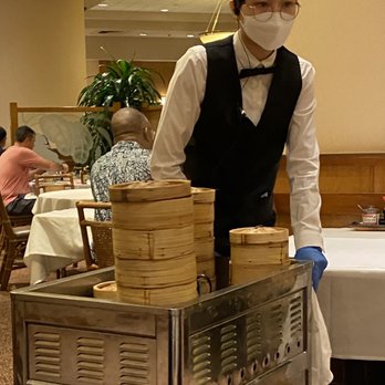 Yank Sing - Rolling carts with server - Dim Sum Near Me - San Francisco, California Yank Sing - Rolling carts with server - Dim Sum Near Me - San Francisco, California