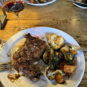 The Roost Chop House - Ribeye and twice baked potatoes, butternut squash and Brussels. - Steakhouses Near Me - Waynesville, North Carolina The Roost Chop House - Ribeye and twice baked potatoes, butternut squash and Brussels. - Steakhouses Near Me - Waynesville, North Carolina