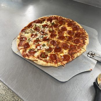 Toarmina’s Pizza - Milan - Pizza fresh out the oven as I walked in - Italian Near Me - Milan, Michigan Toarmina’s Pizza - Milan - Pizza fresh out the oven as I walked in - Italian Near Me - Milan, Michigan