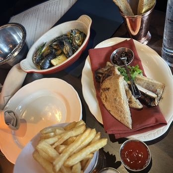 Gilt Bar - Top: steamed mussels; bottom left: French fried potatoes; bottom right: single roasted bone marrow - New American Near Me - Chicago, Illinois